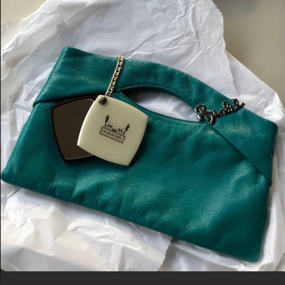 ISO Henri Bendel green clutch